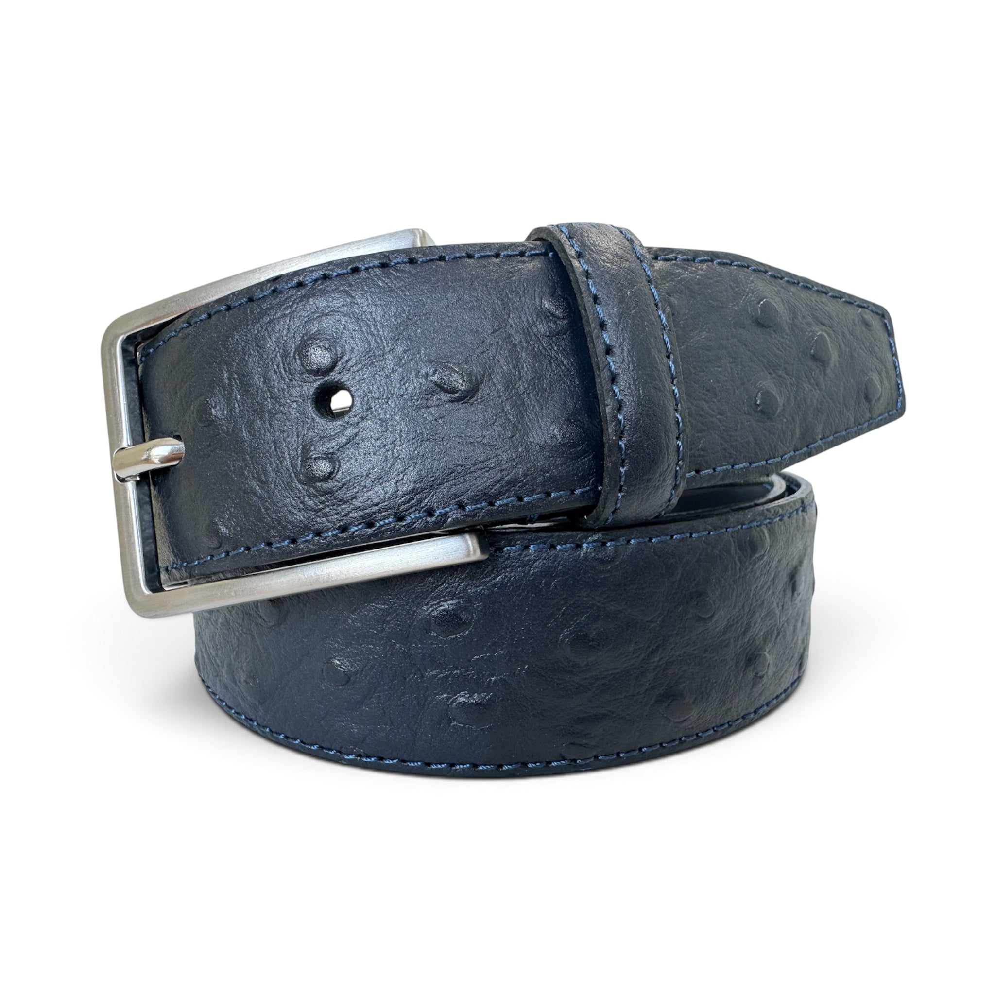 A dark navy blue ostrich leather belt with a silver-tone metal buckle, neatly coiled on a white background.