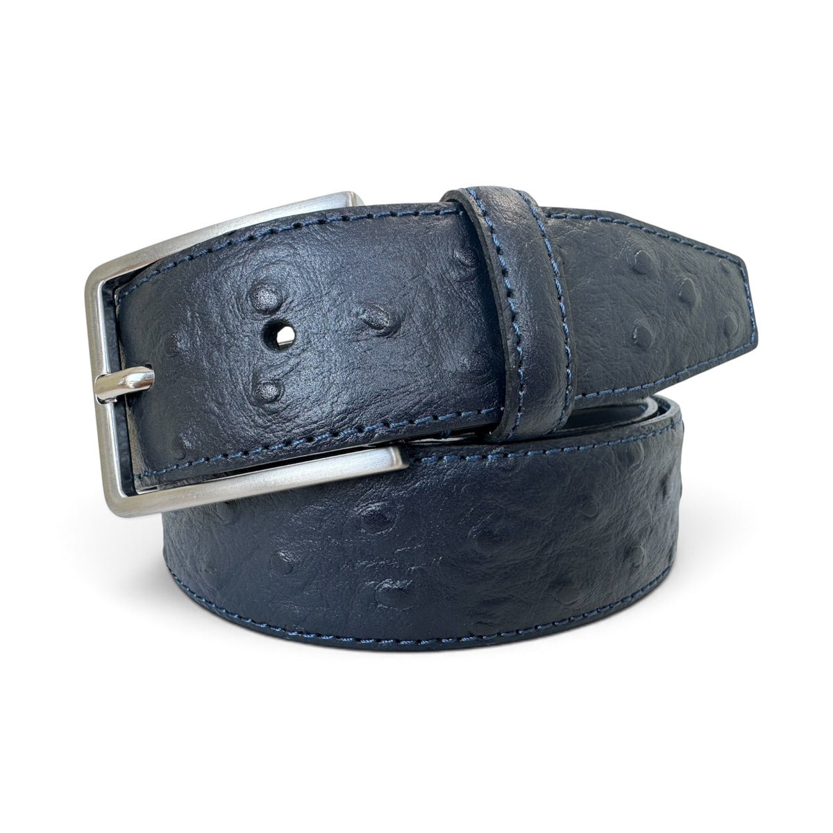 A dark navy blue ostrich leather belt with a silver-tone metal buckle, neatly coiled on a white background.